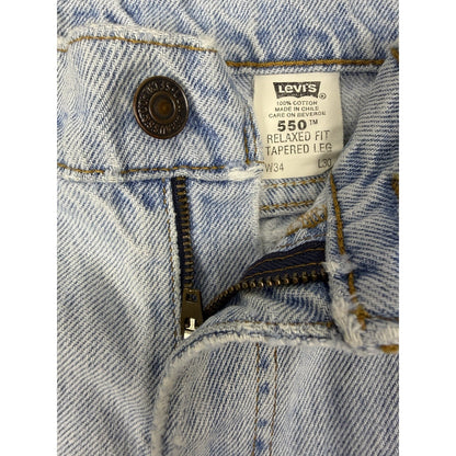 Vintage 90s Levi's 550 Orange Tab tapered jeans, light wash, 34x30