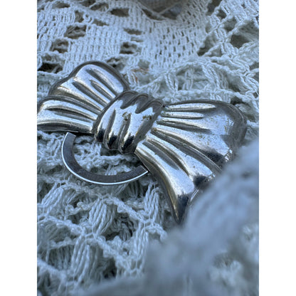 Silver bow scarf clip (1970s)