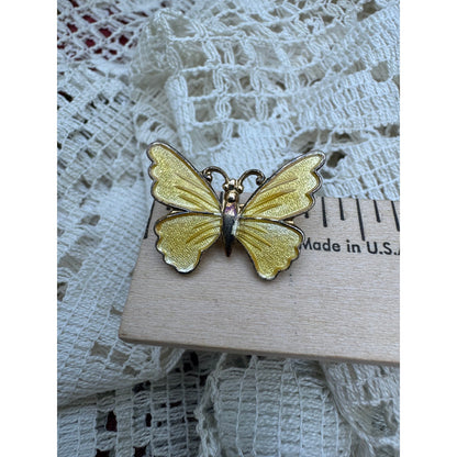 Goldie's golden butterfly brooch (1970s)