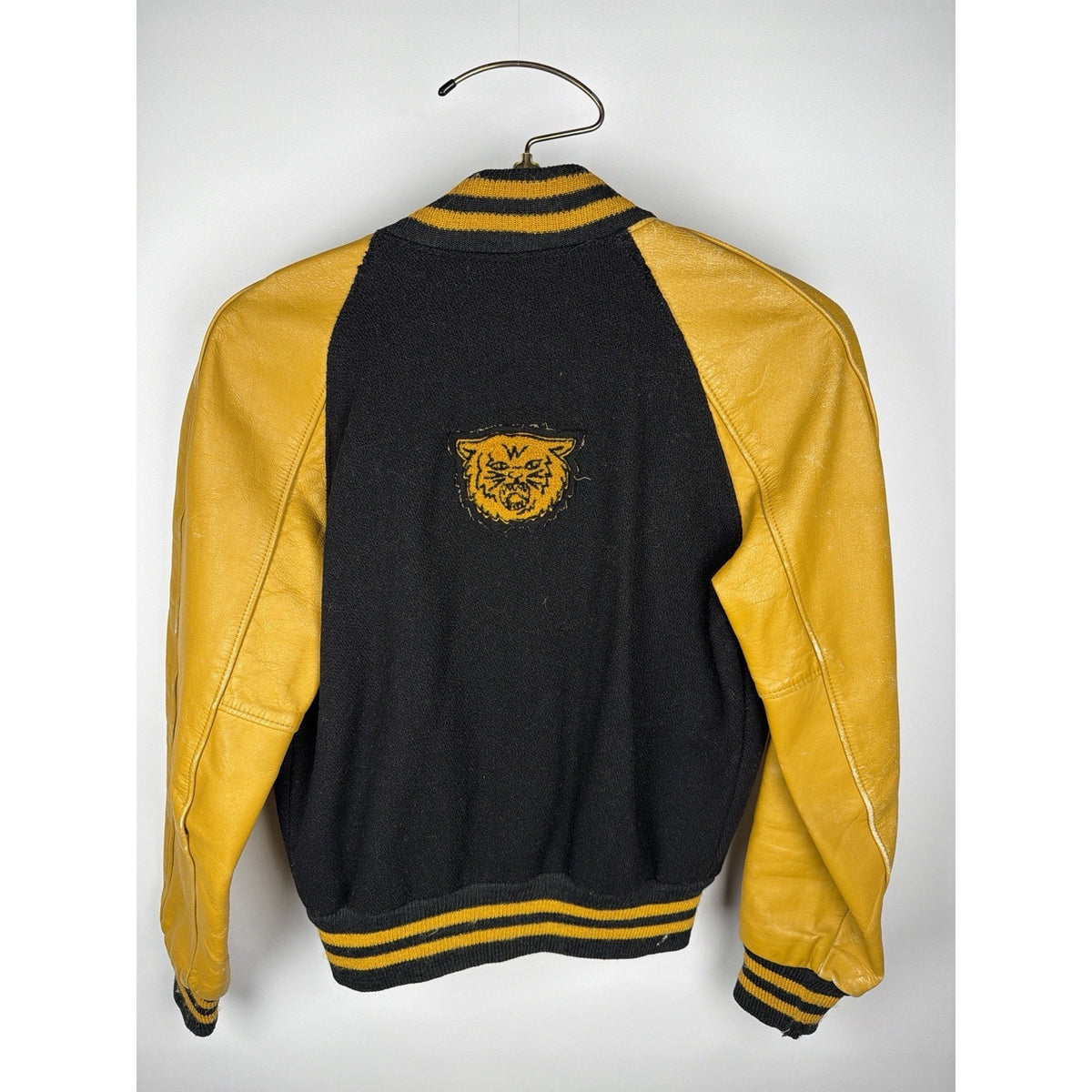 Vintage 1940s-50s black wool and gold leather varsity jacket, H patch