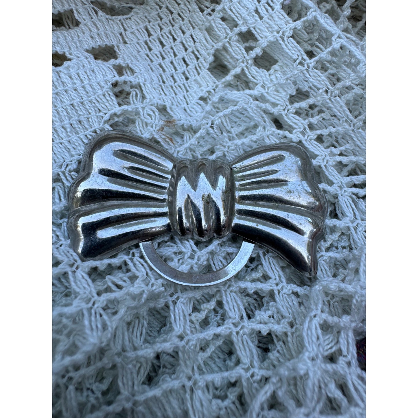 Silver bow scarf clip (1970s)