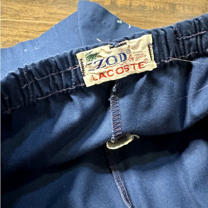 Thrashed Izod Lacoste track shorts (1980s)