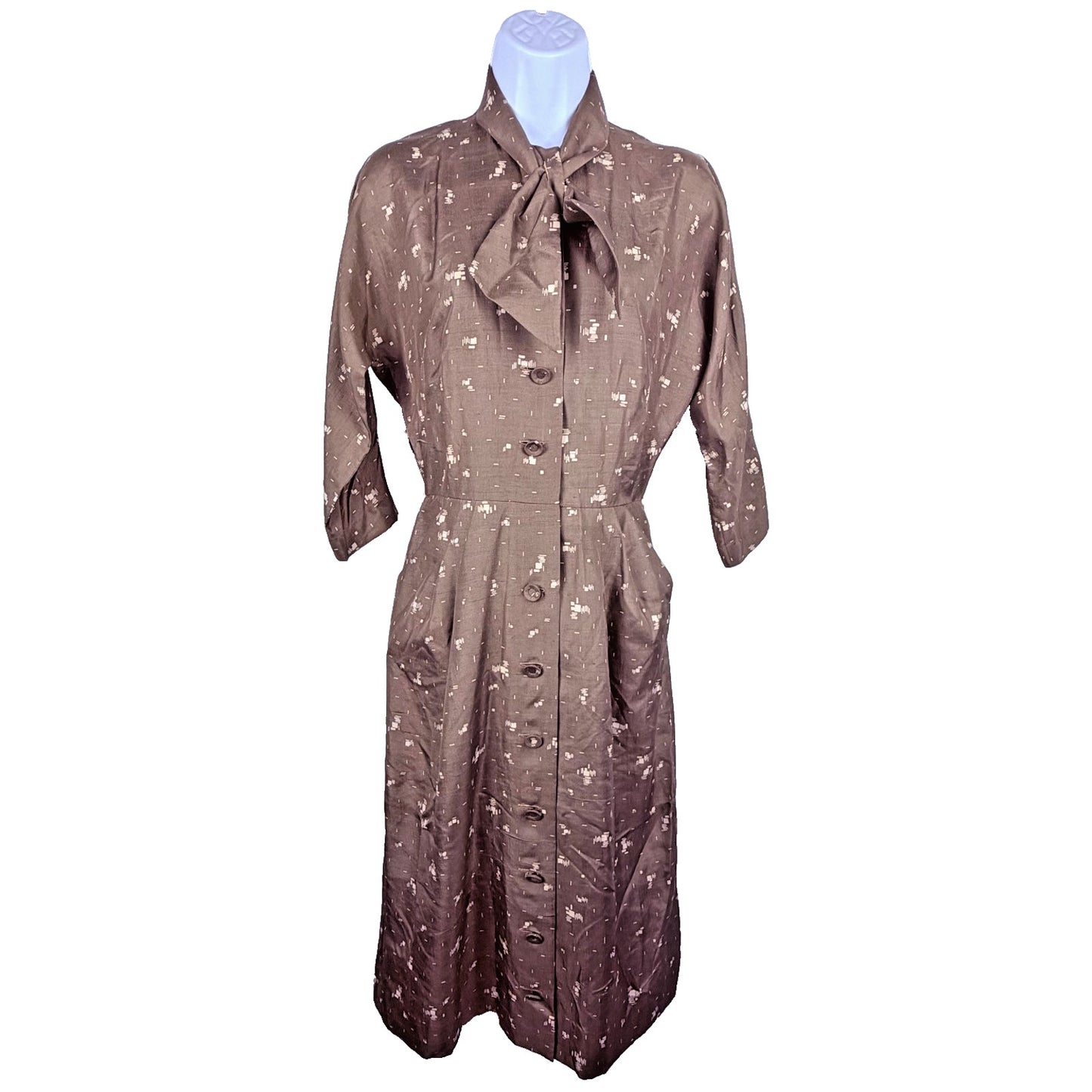 Vintage 1950s geometric button front day dress with neck bow and pockets!
