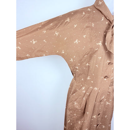 Vintage 1950s geometric button front day dress with neck bow and pockets!