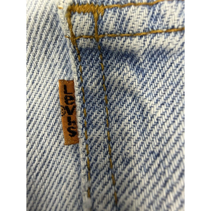 Vintage 90s Levi's 550 Orange Tab tapered jeans, light wash, 34x30