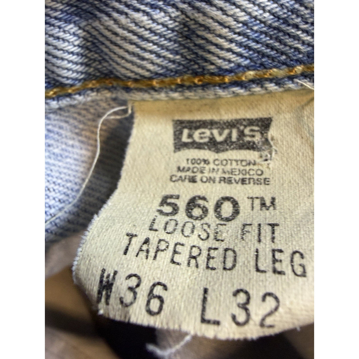 Vintage Levi's 560 comfort fit tapered jeans, cut hems, 36x32