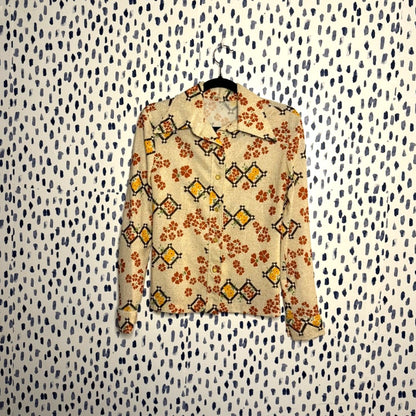 Grandma's couch, folky florarl dagger collar top (1970s)