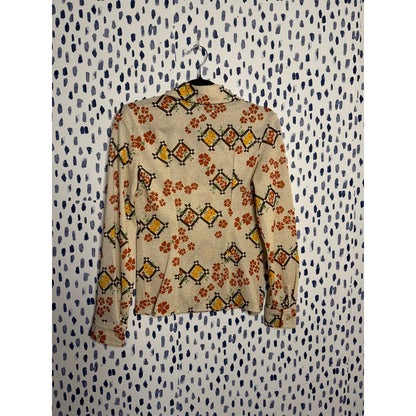 Grandma's couch, folky florarl dagger collar top (1970s)