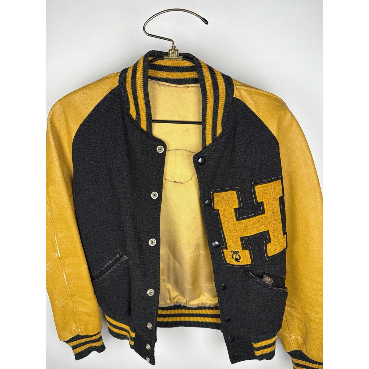 Vintage 1940s-50s black wool and gold leather varsity jacket, H patch