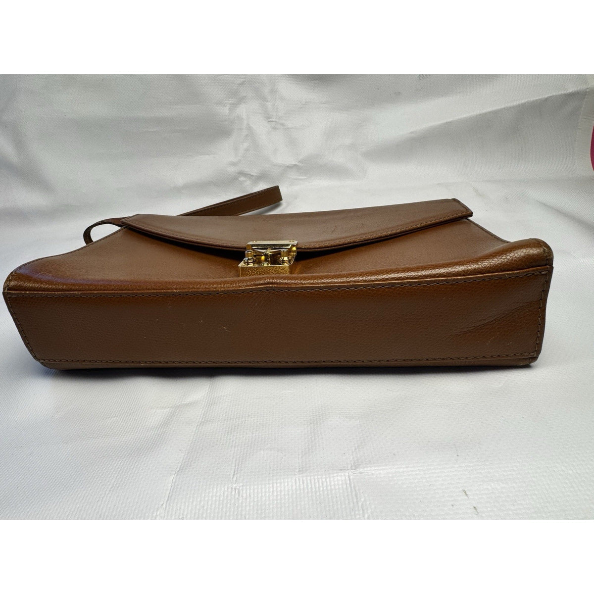 Vintage 1990s Yves Saint Laurent brown leather envelope clutch wrist strap