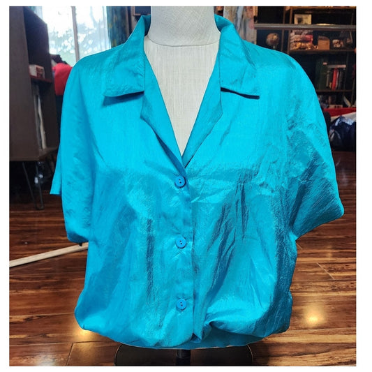 Vibrant thing, shiny button up top (1980s)