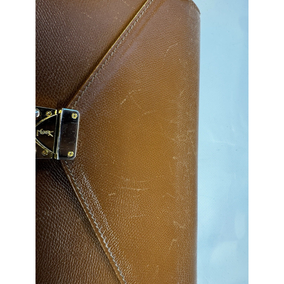 Vintage 1990s Yves Saint Laurent brown leather envelope clutch wrist strap