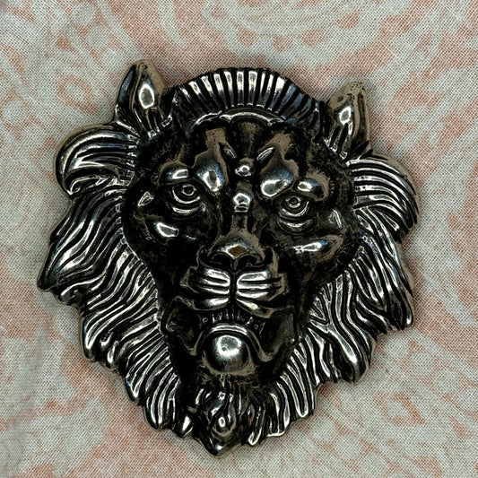 Large Leo, silver lion belt buckle (1970s)