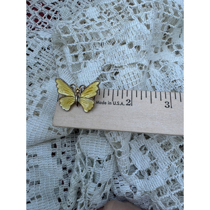 Goldie's golden butterfly brooch (1970s)