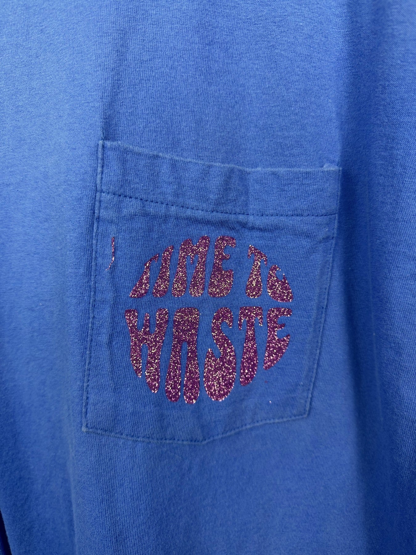 Bright blue Time to Waste pocket tee — detail