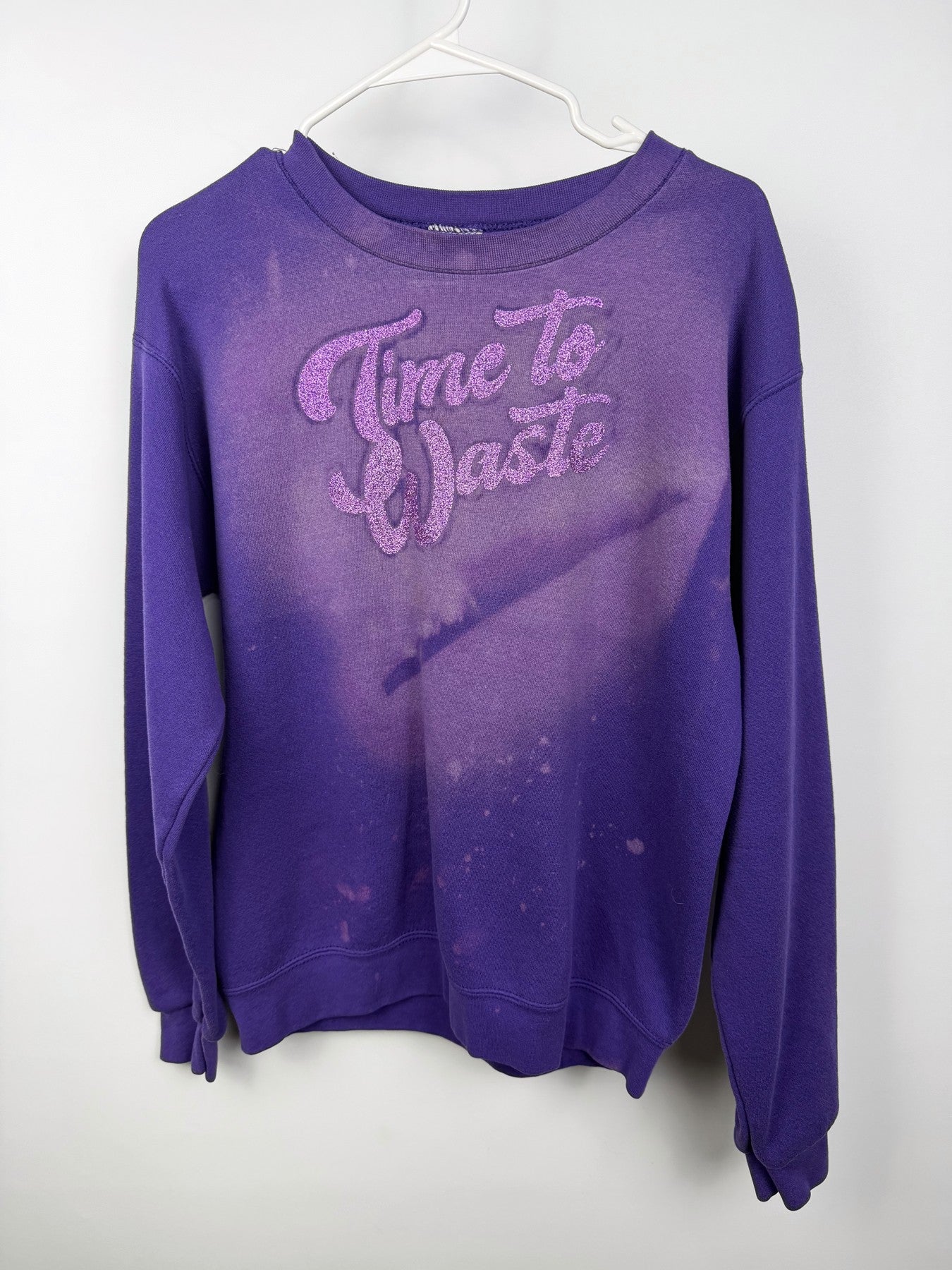 Purple bleached and glittered Time to Waste sweatshirt